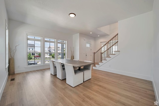 563 W Founders Blvd Unit 90, Saratoga Springs, UT 84045 - unfurnished dining area featuring baseboards, light wood-style floors, recessed lighting, and stairs