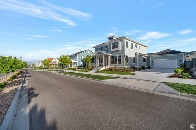 563 W Founders Blvd Unit 90, Saratoga Springs, UT 84045 - view of front of home with driveway, a garage, and a residential view