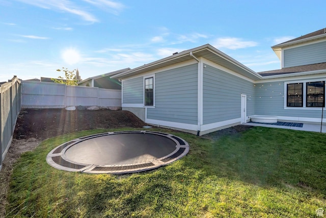 563 W Founders Blvd Unit 90, Saratoga Springs, UT 84045 - back of house with a trampoline