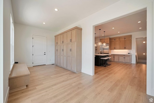 563 W Founders Blvd Unit 90, Saratoga Springs, UT 84045 - entryway with recessed lighting, light wood finished floors, and baseboards