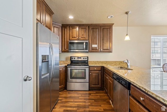 2043 W 1080 N, Provo, UT 84604 - kitchen featuring light stone counters, dark wood finished floors, a sink, appliances with stainless steel finishes, and a textured ceiling