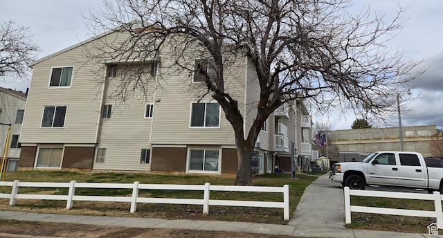 view of home's exterior with a fenced front yard