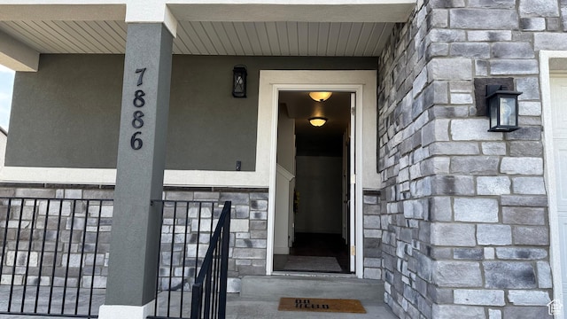 7886 S Fauna Ln W, West Jordan, UT 84081 - property entrance with stone siding and stucco siding