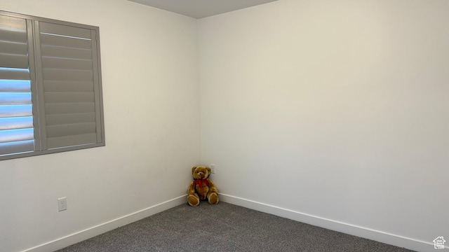 7886 S Fauna Ln W, West Jordan, UT 84081 - carpeted empty room with baseboards