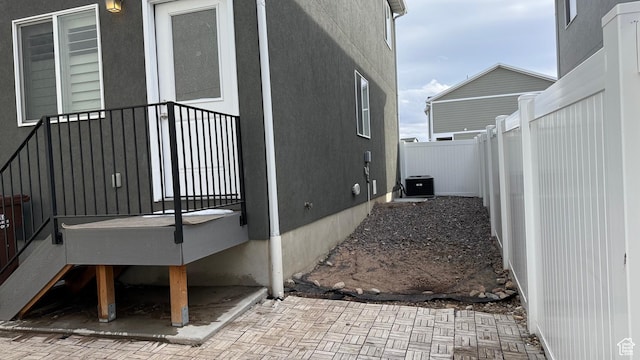 7886 S Fauna Ln W, West Jordan, UT 84081 - view of side of home with fence and central AC