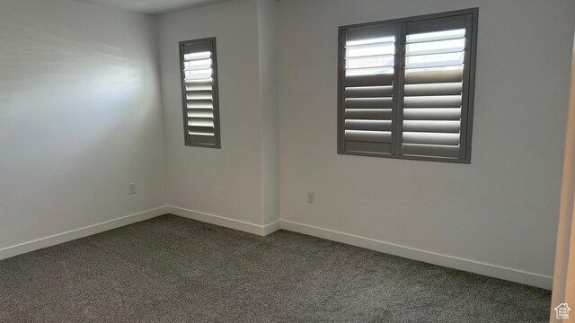 7886 S Fauna Ln W, West Jordan, UT 84081 - unfurnished room with dark colored carpet and baseboards