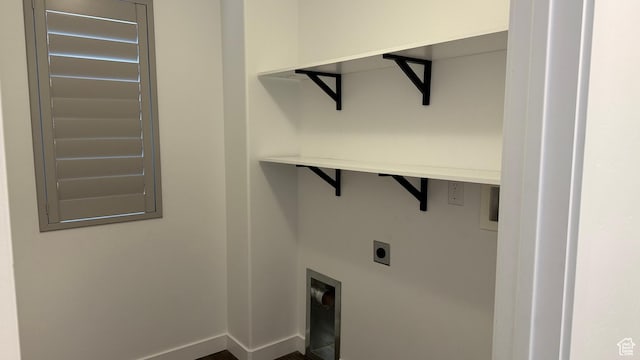 7886 S Fauna Ln W, West Jordan, UT 84081 - washroom with laundry area, hookup for an electric dryer, and baseboards