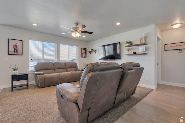 living area with recessed lighting, baseboards, light wood finished floors, and ceiling fan