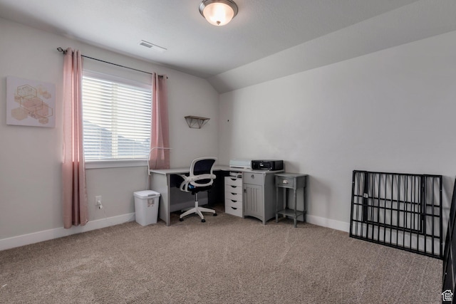 office with vaulted ceiling, carpet, visible vents, and baseboards
