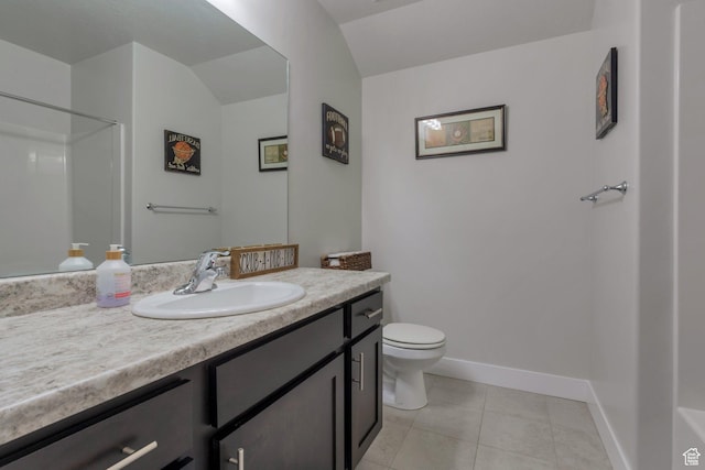 bathroom featuring vanity, tile patterned floors, toilet, and baseboards