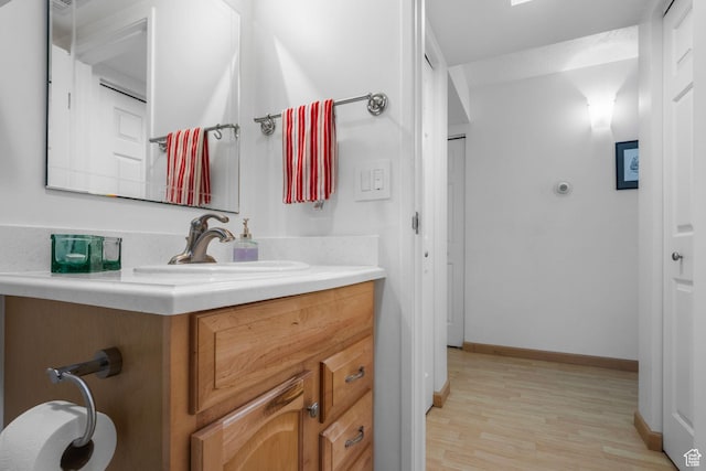 115 S 1100 E Unit 614, Salt Lake City, UT 84102 - bathroom with vanity, wood finished floors, and baseboards