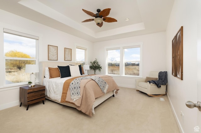 777 S Lake View Dr, Vineyard, UT 84059 - bedroom featuring light colored carpet, baseboards, a tray ceiling, and ceiling fan