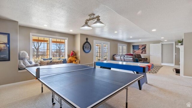 315 Stonehenge, Providence, UT 84332 - rec room featuring baseboards, plenty of natural light, carpet, and french doors