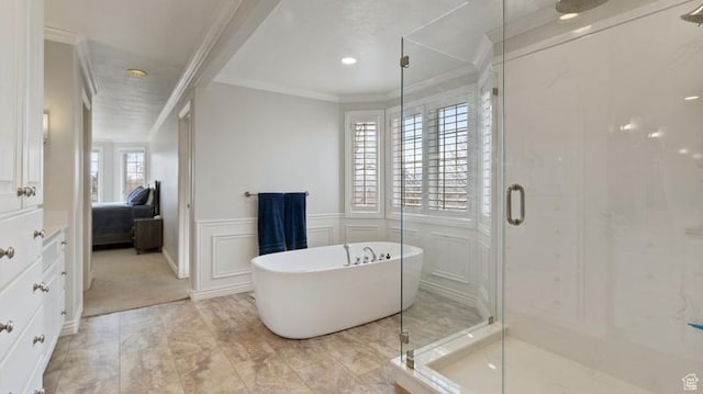 315 Stonehenge, Providence, UT 84332 - full bath with a decorative wall, a stall shower, a freestanding tub, and ornamental molding