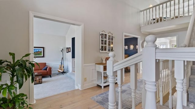 315 Stonehenge, Providence, UT 84332 - staircase with a decorative wall, wood finished floors, and wainscoting