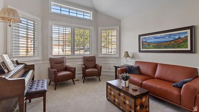 315 Stonehenge, Providence, UT 84332 - living area with carpet flooring, wainscoting, a decorative wall, and vaulted ceiling