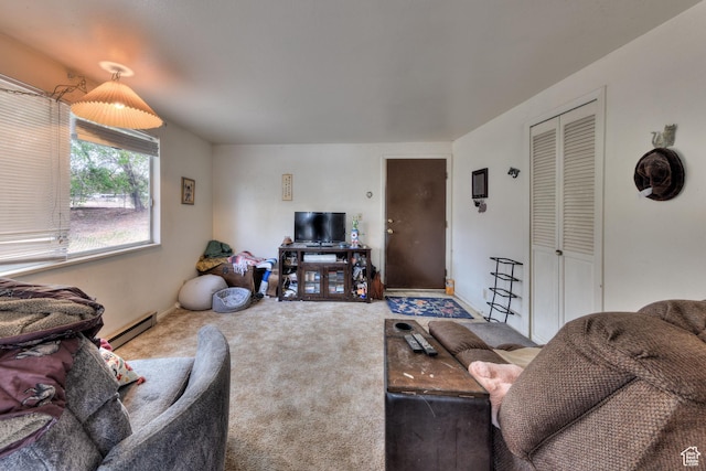 451 & Dr, Moab, UT 84532 - living room featuring a baseboard heating unit and carpet floors