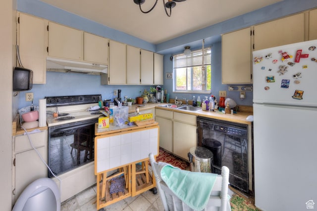 451 & Dr, Moab, UT 84532 - kitchen featuring a sink, freestanding refrigerator, under cabinet range hood, electric range, and cream cabinets