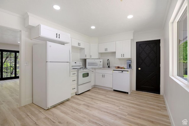 210 Ogden Cyn, Ogden, UT 84401 - kitchen featuring white appliances, white cabinetry, crown molding, and a sink