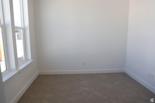 3719 N Janie St Unit 1014, Eagle Mountain, UT 84005 - spare room featuring light carpet and baseboards
