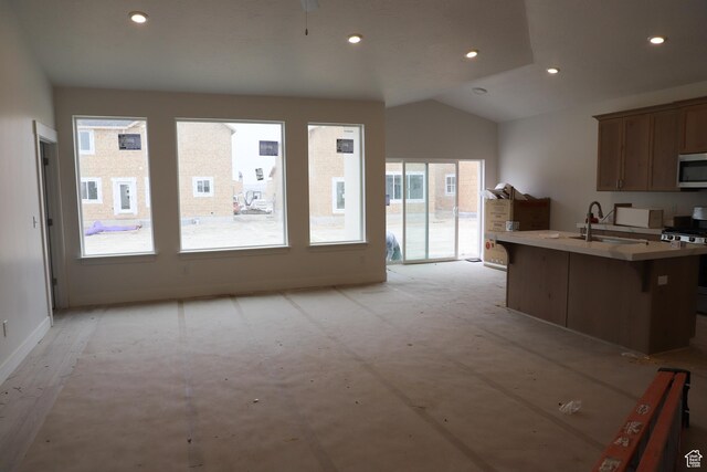 3719 N Janie St Unit 1014, Eagle Mountain, UT 84005 - kitchen with a sink, stainless steel appliances, recessed lighting, and vaulted ceiling