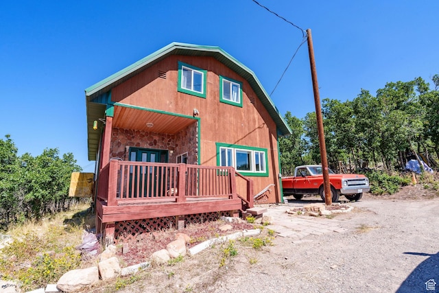 back of property featuring french doors