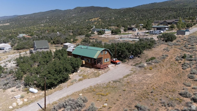 drone / aerial view featuring a mountain view
