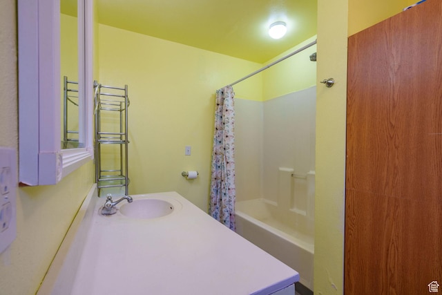 full bathroom with vanity and shower / bathtub combination with curtain