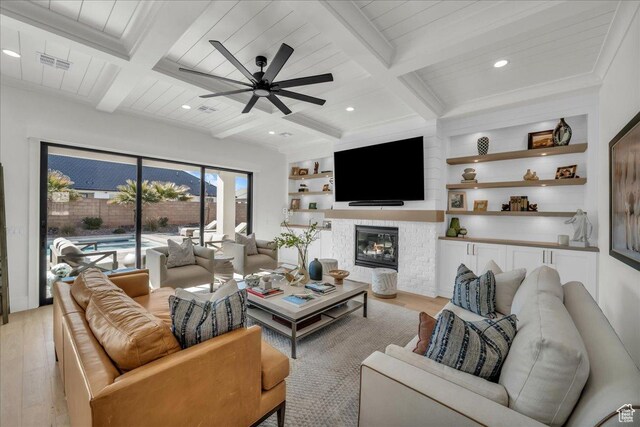 2904 E Stonedale Dr, St George, UT 84790 - living area with beamed ceiling, light wood-style flooring, a ceiling fan, and visible vents