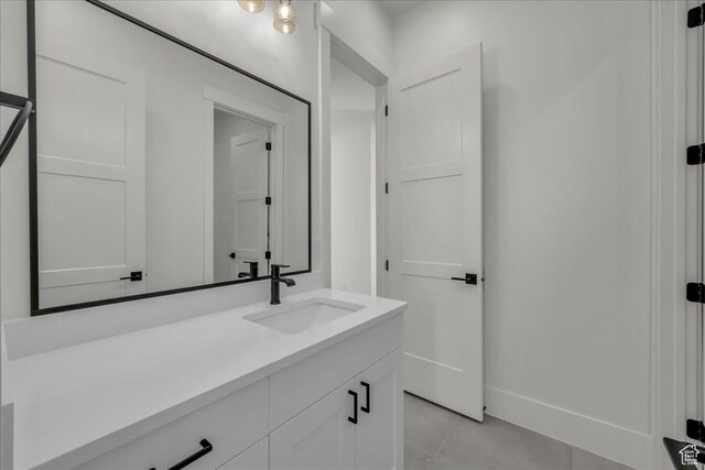 2904 E Stonedale Dr, St George, UT 84790 - bathroom with vanity, tile patterned floors, and baseboards
