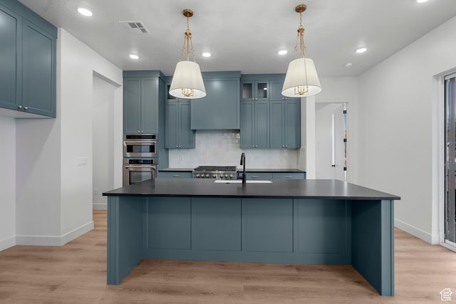2911 W Rock Ridge Rd, Cedar City, UT 84720 - kitchen featuring visible vents, light wood finished floors, stainless steel double oven, dark countertops, and a sink