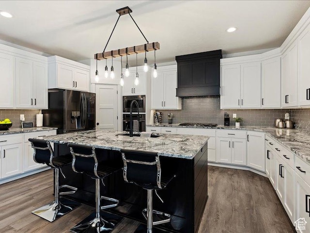 170 W 825 S, Willard, UT 84340 - kitchen featuring white cabinetry, custom range hood, dark wood-style flooring, and appliances with stainless steel finishes