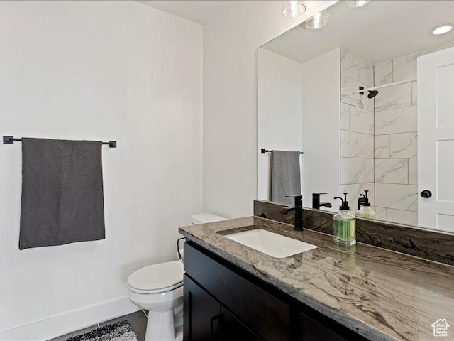 170 W 825 S, Willard, UT 84340 - bathroom with baseboards, tiled shower, toilet, and vanity