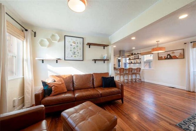 771 E Belmont Ave, Salt Lake City, UT 84105 - living area featuring recessed lighting, wood finished floors, and baseboards
