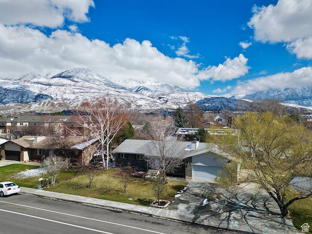 property view of mountains featuring a residential view