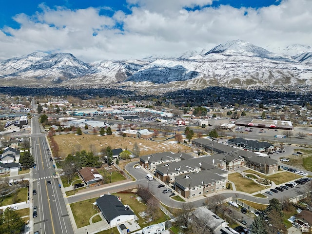 birds eye view of property with a residential view and a mountain view
