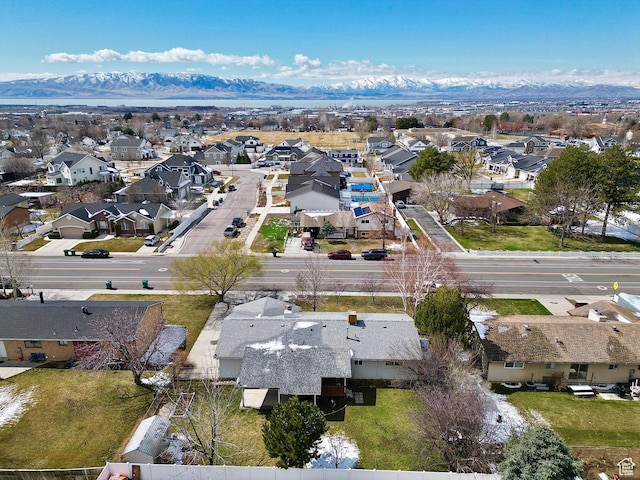 bird's eye view with a residential view and a mountain view