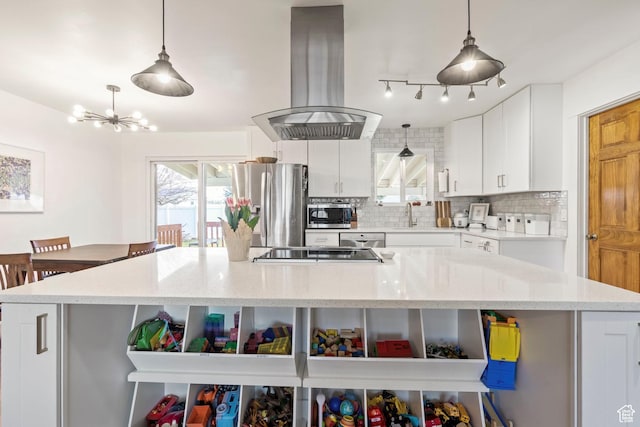 kitchen with island exhaust hood, open shelves, a kitchen island, backsplash, and appliances with stainless steel finishes