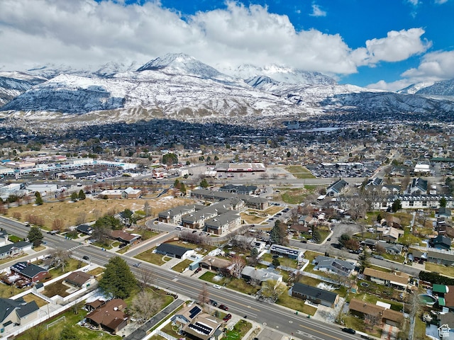 drone / aerial view featuring a mountain view and a residential view