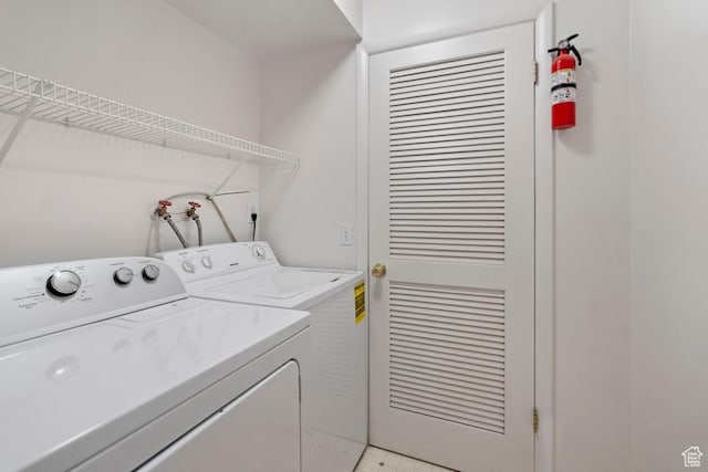 laundry room featuring laundry area and washing machine and dryer