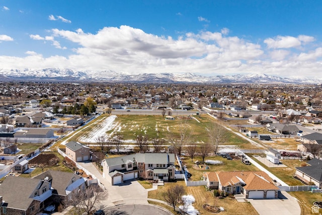 aerial view with a mountain view and a residential view