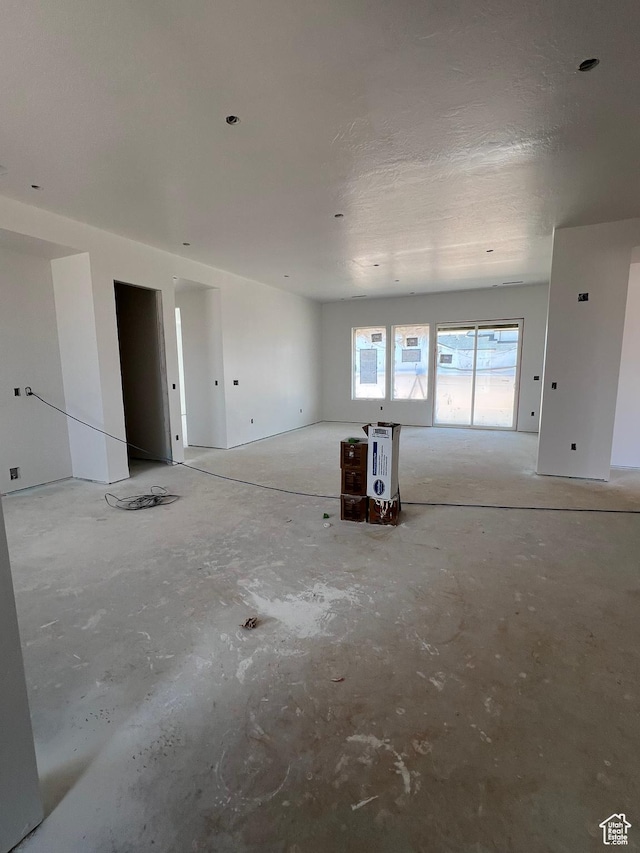 5166 N 2525 W Unit 16, Cedar City, UT 84721 - unfurnished living room with unfinished concrete flooring