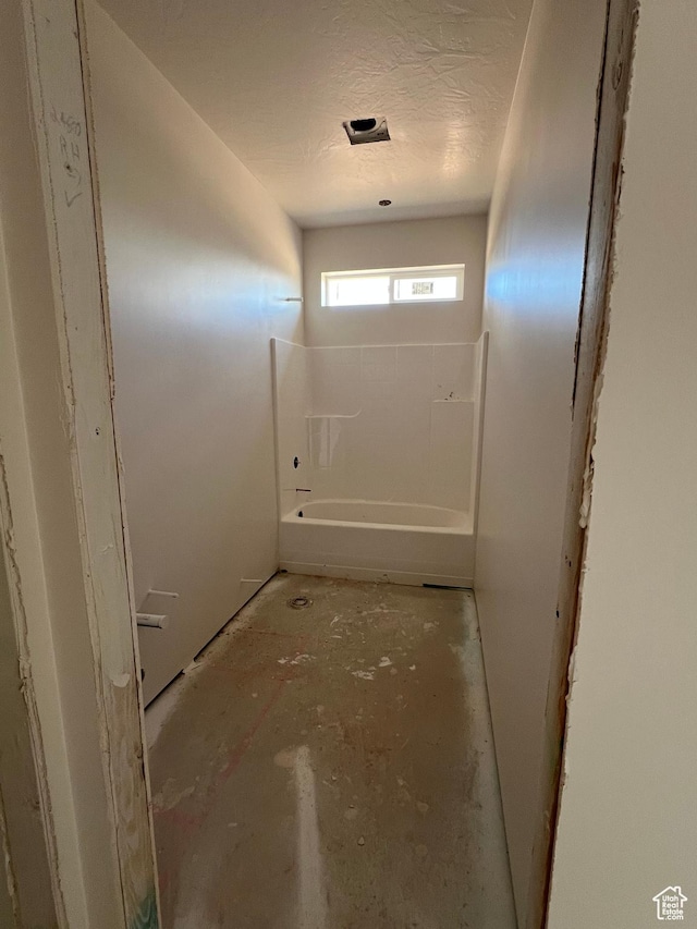 5166 N 2525 W Unit 16, Cedar City, UT 84721 - bathroom with a textured ceiling and shower / bathtub combination