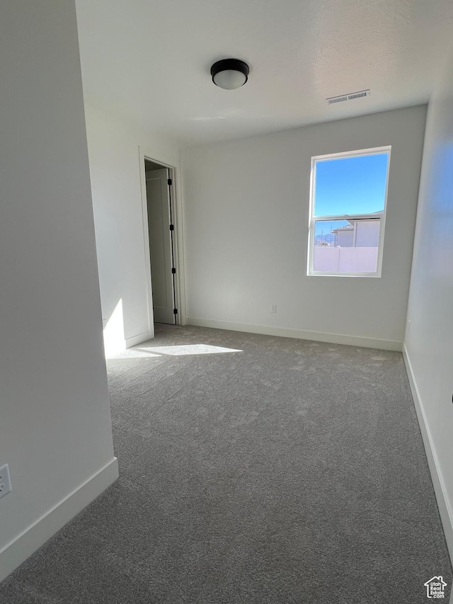 5166 N 2525 W Unit 16, Cedar City, UT 84721 - unfurnished room with baseboards, carpet, and visible vents
