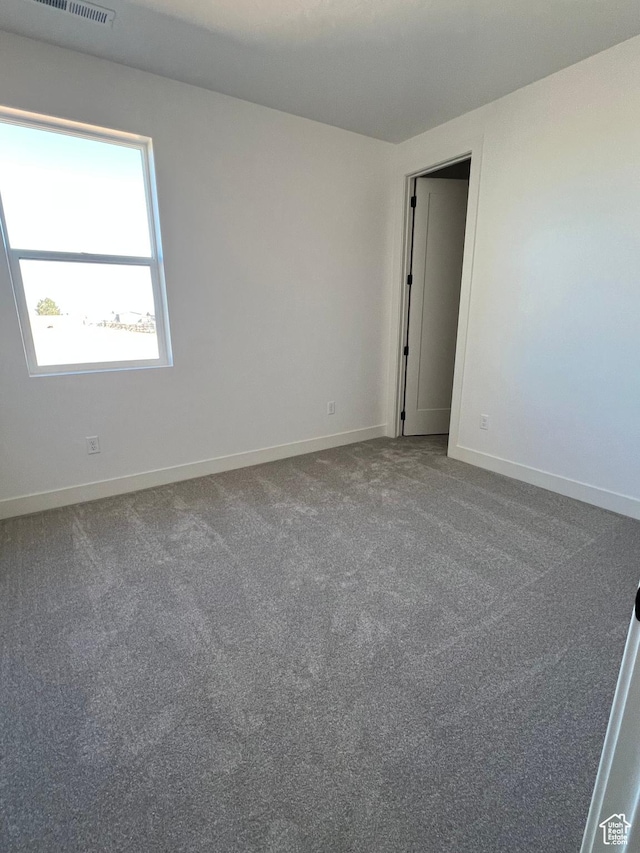 5166 N 2525 W Unit 16, Cedar City, UT 84721 - empty room with carpet floors and baseboards