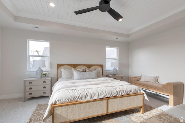 2123 N 520 W, Centerville, UT 84014 - bedroom featuring carpet floors, a tray ceiling, visible vents, and multiple windows