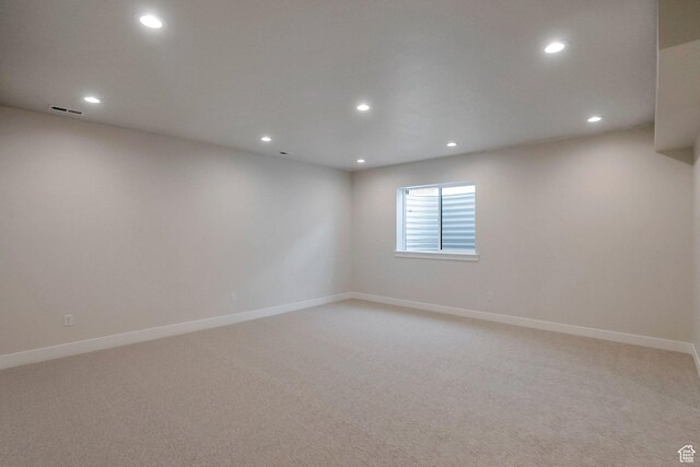 2123 N 520 W, Centerville, UT 84014 - spare room with baseboards, visible vents, recessed lighting, and light colored carpet