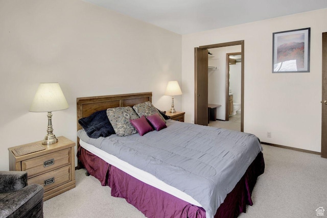 7065 N 2200 W Unit 2W, Summit Park, UT 84098 - bedroom featuring baseboards, light carpet, a closet, and a spacious closet