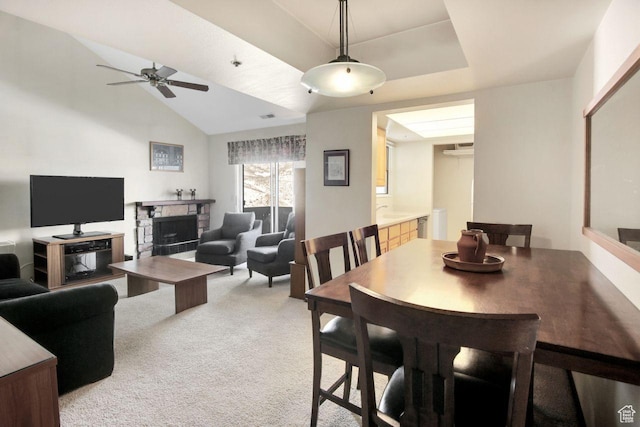 7065 N 2200 W Unit 2W, Summit Park, UT 84098 - dining space featuring a ceiling fan, visible vents, lofted ceiling, a fireplace, and light carpet