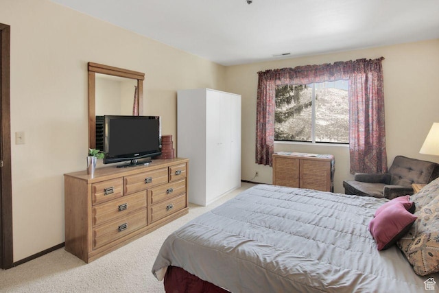 7065 N 2200 W Unit 2W, Summit Park, UT 84098 - bedroom featuring visible vents, baseboards, and light carpet